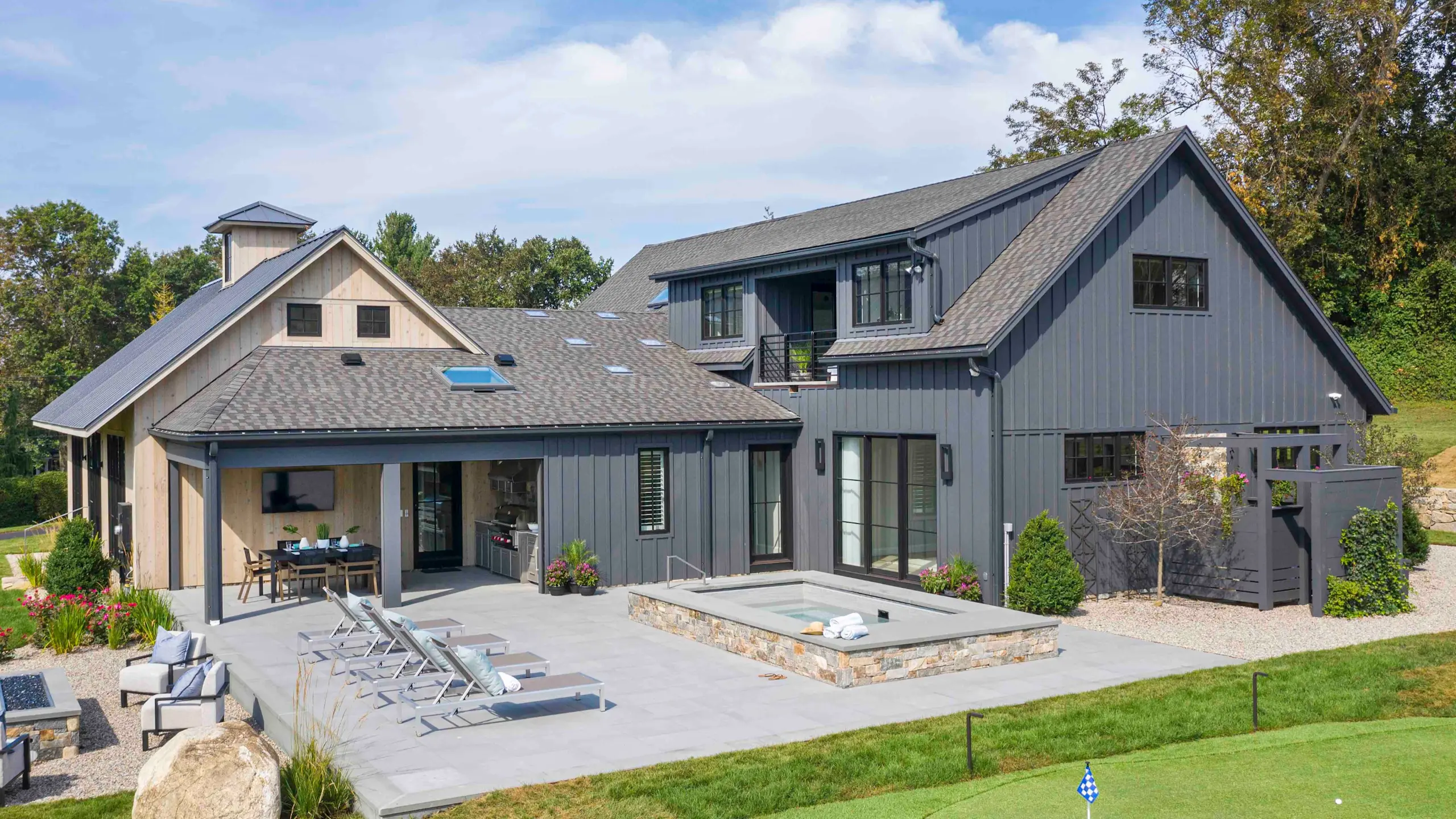 Home featuring LP SmartSide vertical siding