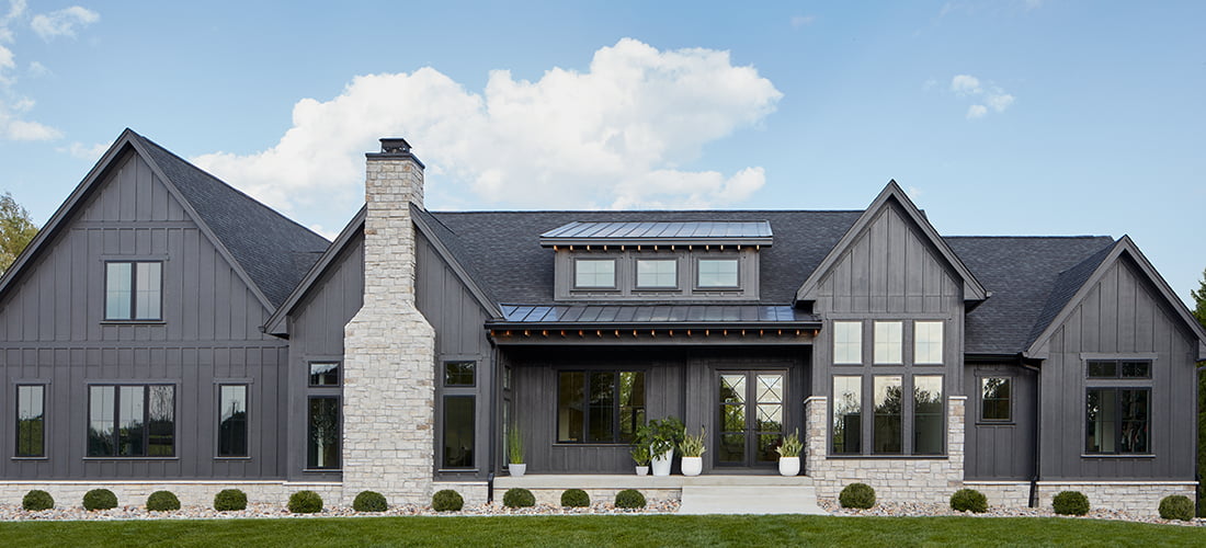 Pella Impervia black windows on a modern home